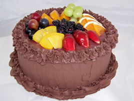 Large Chocolate Frosted Cake with Fruit