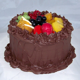 Small Chocolate Frosted Cake with Fruit