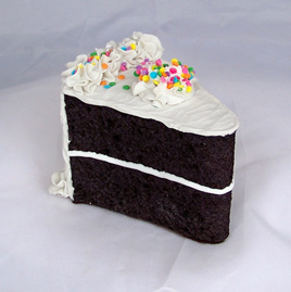 Vanilla Frosted Slice of Chocolate Cake with Pastel Sprinkles